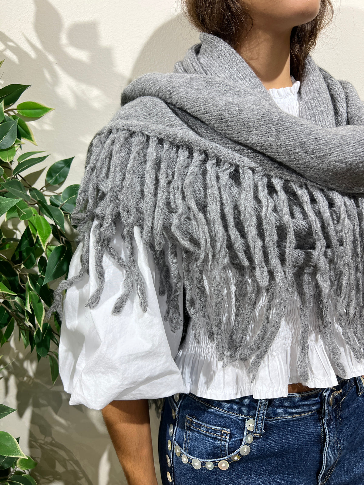Capa flecos gris