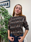 Blusa negra nido de abeja