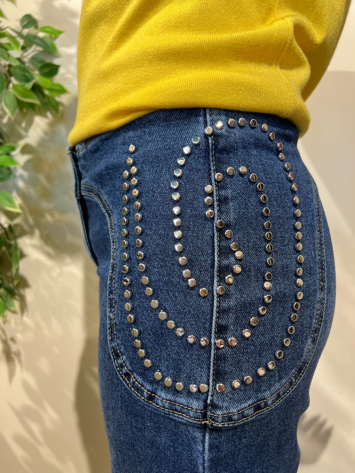 Vaquero denim tachuelas
