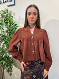Blusa teja