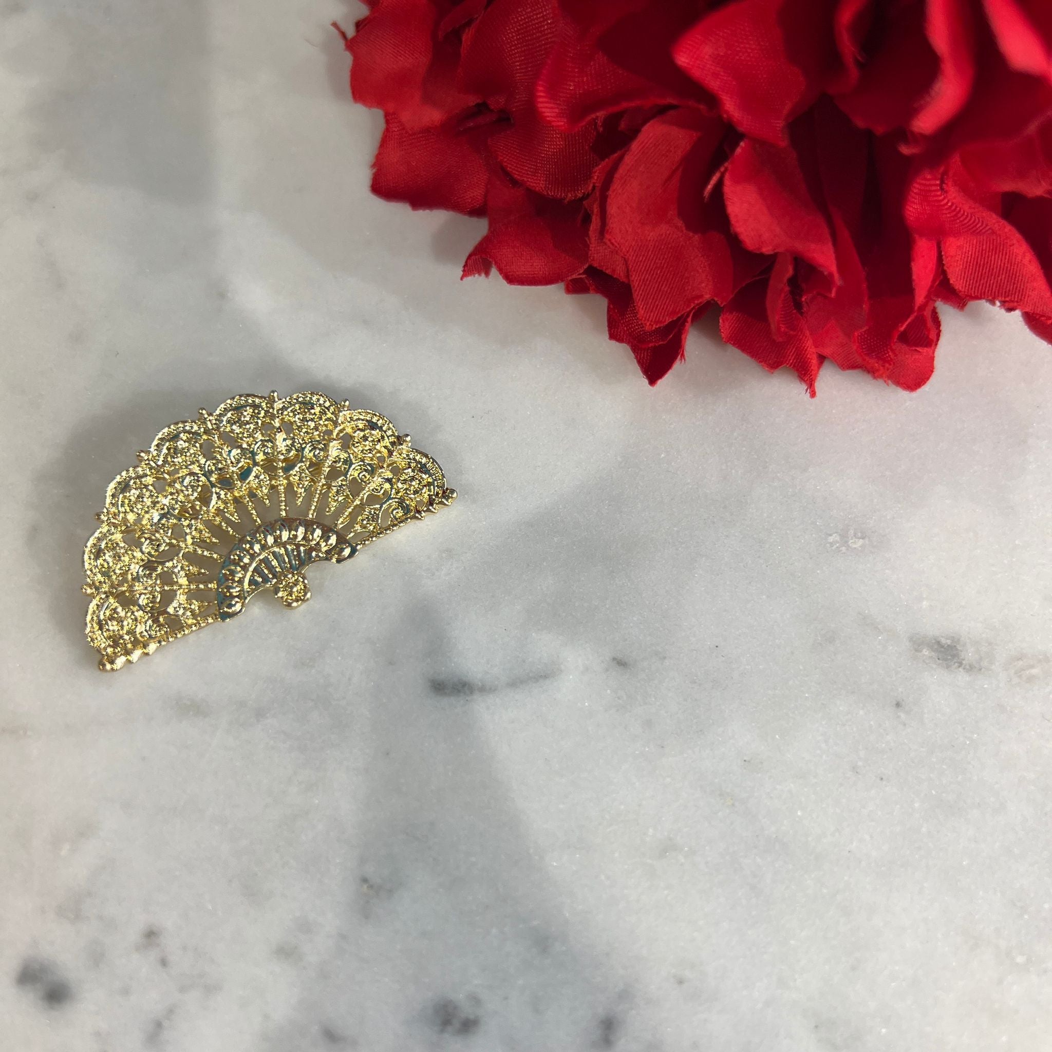 Broche abanico
